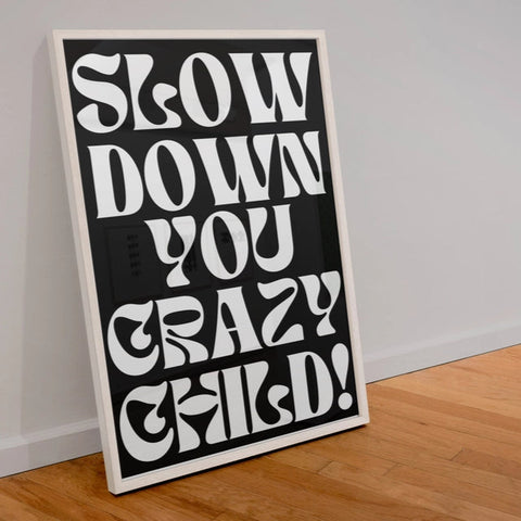 Slow Down You Crazy Child Framed Print